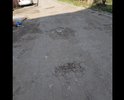Большие ямы во дворе дома необходимо устранить