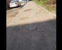 Большие ямы во дворе дома необходимо устранить