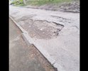 Полностью убитая дорога, огромные ямы глубиной 15 см и шириной по полметра. Необходимо устранить и положить на асфальт