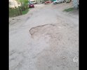 Полностью убитая дорога, огромные ямы глубиной 15 см и шириной по полметра. Необходимо устранить и положить на асфальт