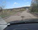 Ямы, выбоины, волны в дорожном покрытии дороги от поворота на Ясаулку в сторону Орджоникидзевского района, Новокузнецк
