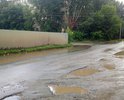 огромные ямы на перекрестке улицы Бурденюка и Молодова после дождя заполнены водой не возможно проехать на автомобиле не зацепив днищем о дорожное покрытие бугра