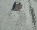 глубокая яма на перекрестке