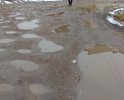 Ни проехать, ни пройти по дороге ул. Полевая,4 - переулок Дженнера,4. Сплошные ямы, сливающиеся после дождя в одну большую лужу.