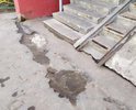 Ямы около подъезда.Просьба произвести работы: отремонтировать.