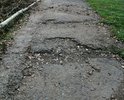 дефекты на тротуаре рядом с начальной школой N 12 и больницей