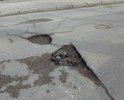 Вся дорога в ямах, все люки выше или ниже полотна