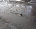Ямы на проезжей части дороги! После зимы снег и наледь сходят вместе с асфальтом, вот такое качество выполняемых работ!!!