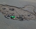 Вся улица Полупанова в огромных ямах