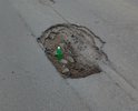 Вся улица Полупанова в огромных ямах