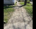 Ул Немичевых,асфальтные дорожки разбиты,лужи и грязь