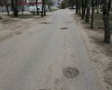 Разбита дорога ведущая к магазинам "Магит" и "Соловьи". Со стороны улиц народной.