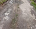 разбитая дорога.