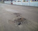Асфальт меняли не так давно.                      Но небыло проведено земляных работ - подготовка дорожной подушки, дренаж. Асфальт вспучивает и крошит, слой явно тонкий.
