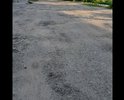 полное отсутствие асфальтового покрытия(во время и после дождя озеро),глубокие ямы и выбоины .невозможно проехать не зацепив днище автомобиля,в ближайшее время возможно повреждение автомобиля.местами ямы с резким обрывом,возможно повреждение колеса автомобиля(надрез резины)!!!!!!