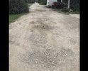 По состоянию на 11.09.21 по ул. Полковая (между Октябрьской и ул. Багдановская) имеется ряд дефектов покрытия проезжей части в виде ямочности, выбоин. На протяжении нескольких лет дорожными службами ни разу не выполнялся ремонт покрытия. Содержание данной дороги отсутствует совсем. При выпадении осадков  водоотвод не обеспечен, что ведёт к постоянным застоям воды на проезжей части.  Для обеспечения безопасного и бесперебойного проезда по данному участку необходимо ремонтное профилирование проезжей части с добавлением нового инертного материала! Также хочу отметить что на данной улице нет освещения что создаёт неудобства для пешеходов в вечернее время. Уважаемые чиновники на основании вышеизложенного прошу выполнить комплекс мероприятий по устранению данных проблем в кратчайшие сроки. Дать ответ по решению данной проблемы
