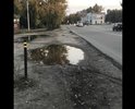 Данный участок тротуара, как после бомбешки, не ремонтировался более 30-ти лет, осенний-весенний период заливает водой с проезжай части, с коляской проехать-это ещё тот квест. Очень большой поток людей, а именно: студенты идущие в колледж, школьники идущие в школу №5, детский садик, Дзержинская поликлиника.
2 года подряд пишем заявления на имя главы города Соколова А. на ремонт и восстановление участка.
В 2020 году обещали подсыпать ямы, дабы после дождей не выходить людям на проезжую часть, увы не подсыпали.
В 2021 году администрация города сделала смету и дала письменное обещание на ремонт тротуара, который должен был уже быть закончен, но к сожалению ремонт даже и не начинался.
