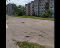 Дорога в ямах и дефектах после подземных работ по замене коммуникаций.