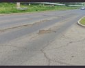 На данном участке дороги выбоины превышают 1,5 метра в длину и глубина более 15 см. А также не горит освещение. Администрация города на жалобы только отписывается, вечером ездить опасно и для водителей и для пешеходов, пешеходов не видно, особенно тех,кто выходит на прогулку с собакой, везде ямы, водители пытаются их объехать, выезжая на встречную полосу,что приводит к аварийным ситуациям. Движение является не безопасным.
