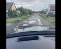 Прошу обратить внимание на отсутствие дороги на ул Анисовая. Ранее я уже направлял фотографии по этой улице, но мне отвечали что это локальный дефект. Но, чтобы был локальный дефект, должна сначала быть дорога. Ее к сожалению здесь никогда не было. Жители конечно пытаются ее отсыпать, но сами видите в каком она состоянии.